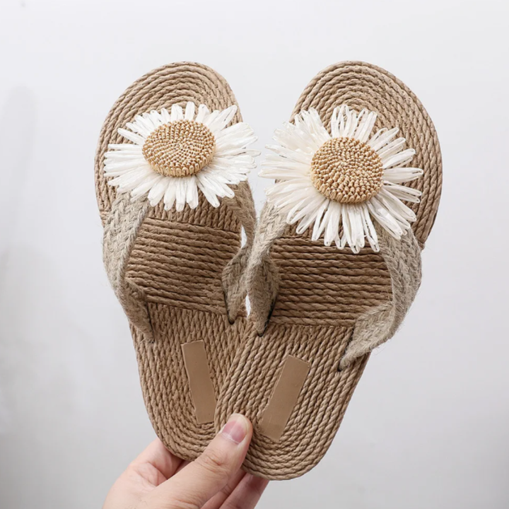 Sunflower sandals held by hand