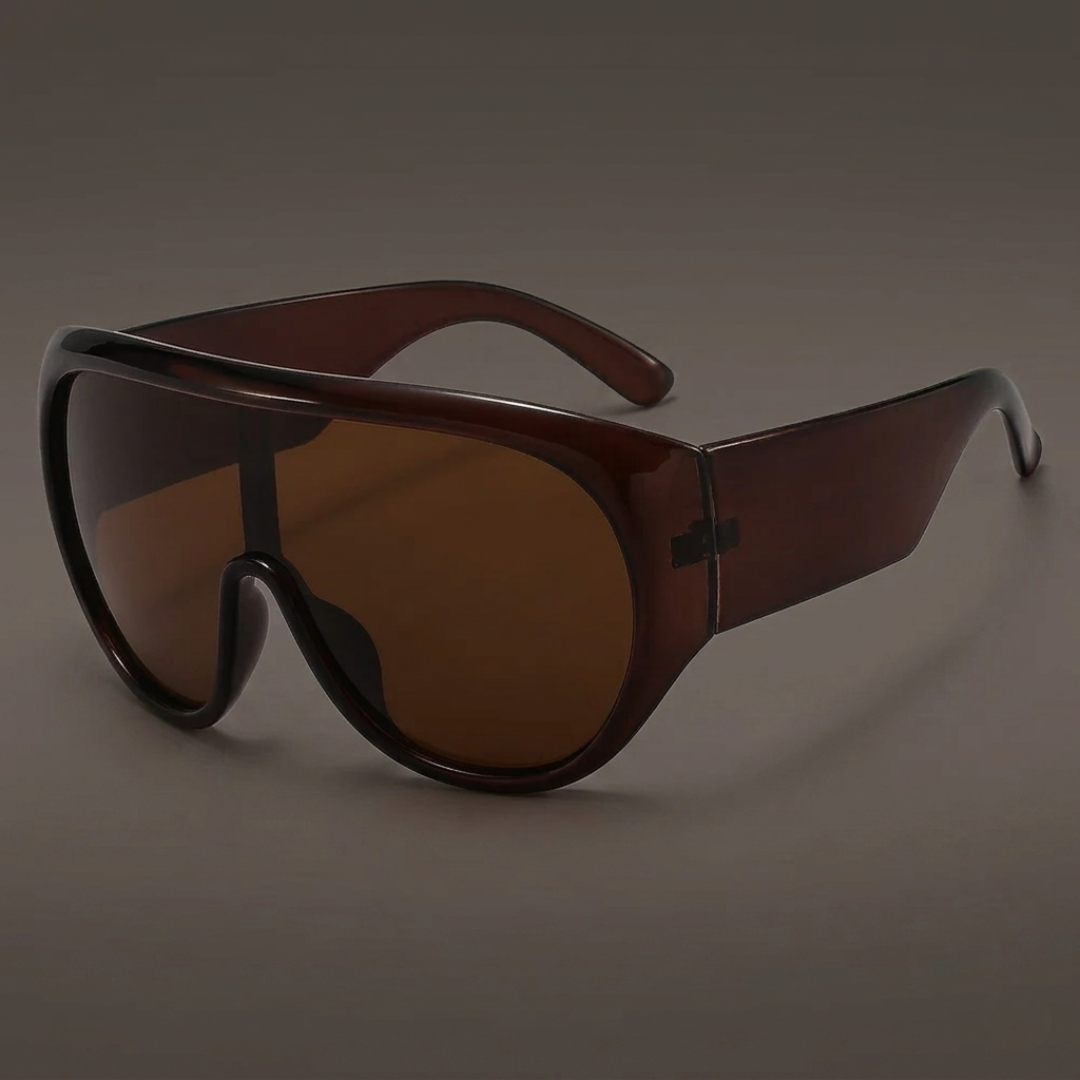 Tea sunglasses with a reflective surface on a dark background