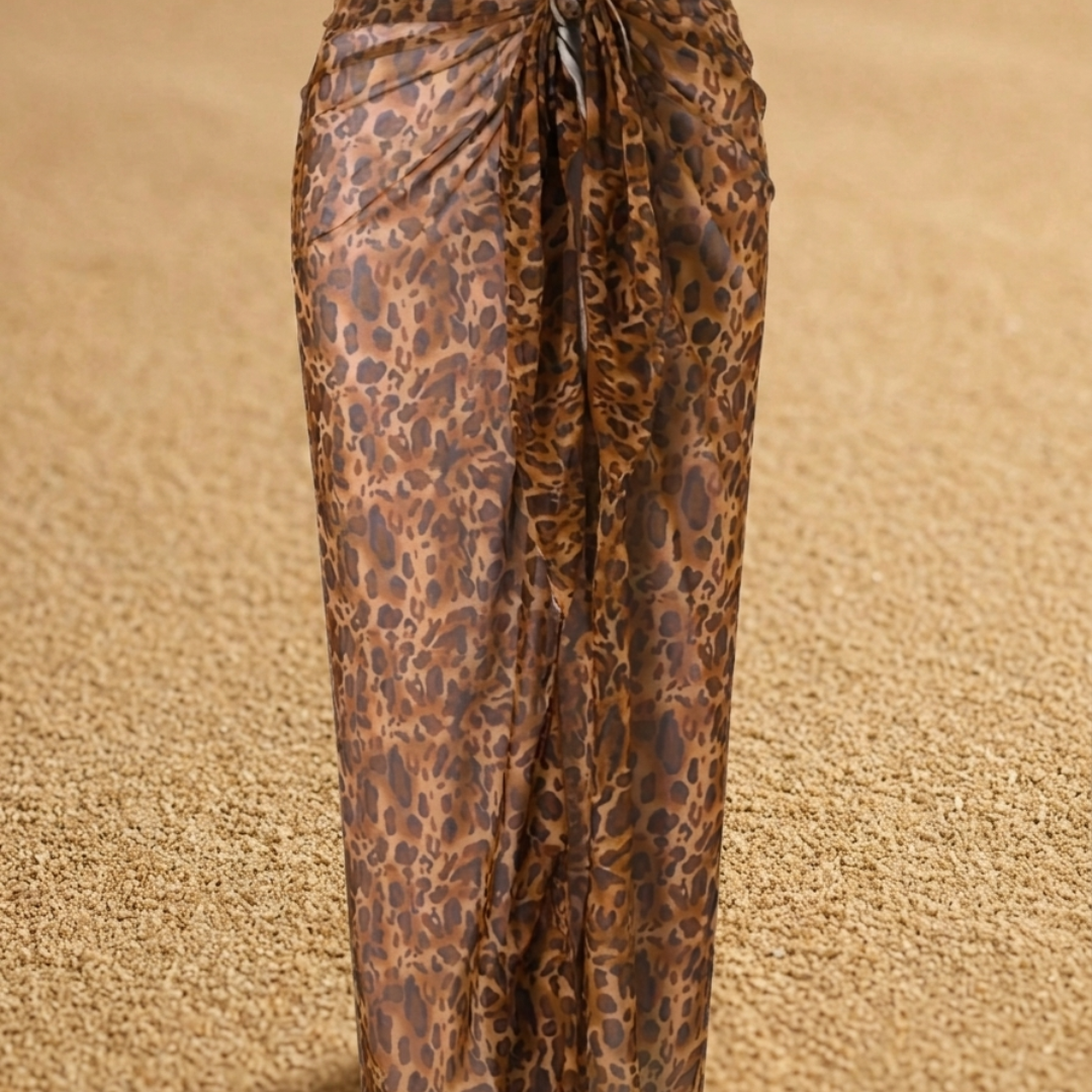 Leopard print pants on a beige background