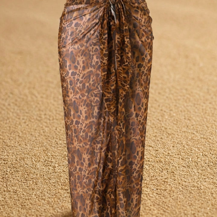 Leopard print pants on a beige background