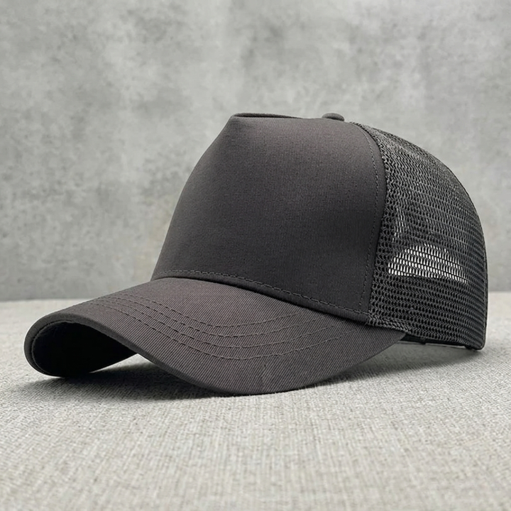 Gray mesh cap on a gray textured surface