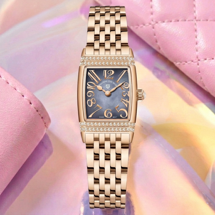 Gold wristwatch with a black face on a pink background