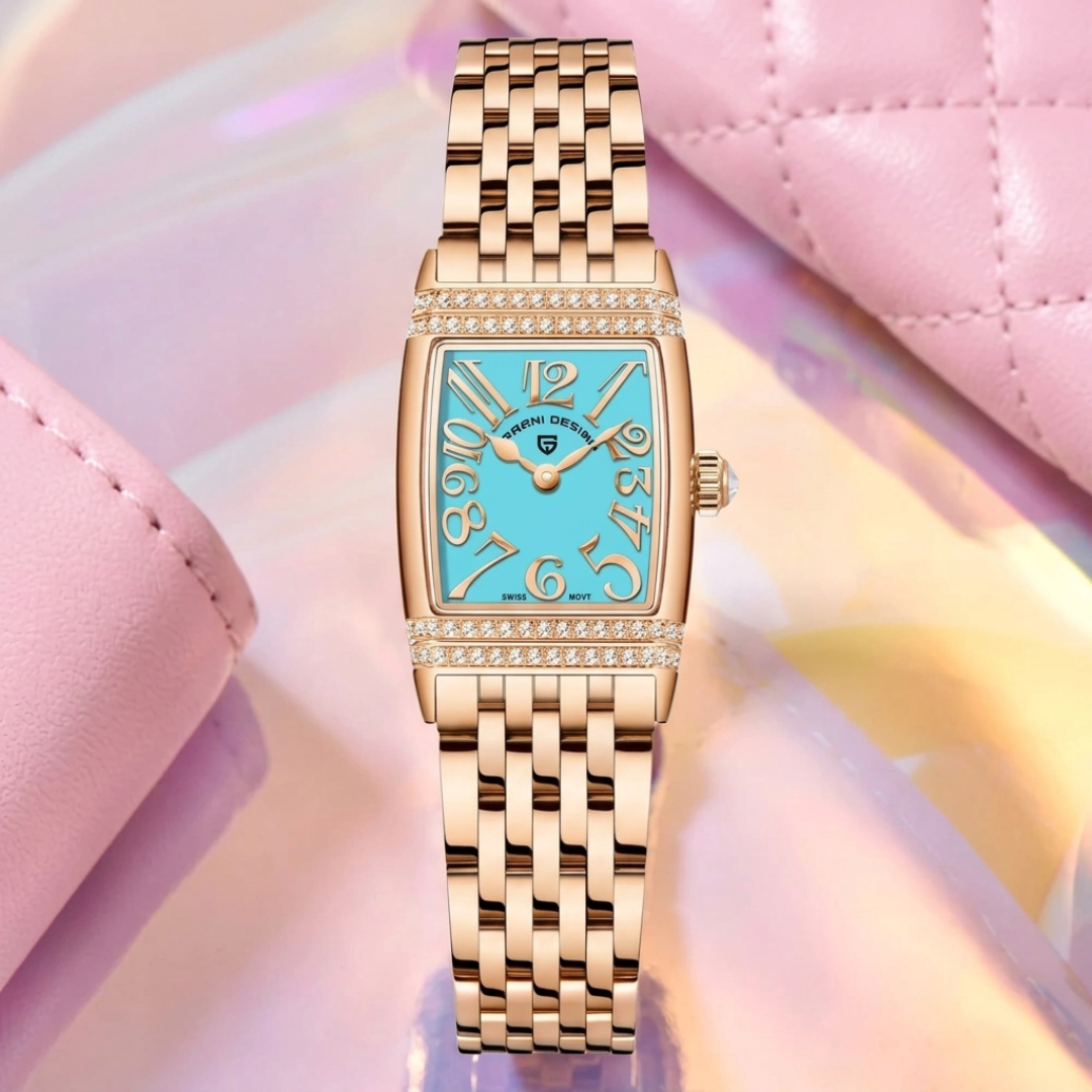 Gold watch with a blue face on a pink and yellow gradient background
