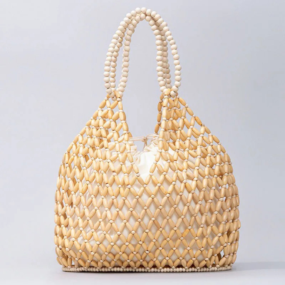 Yellow woven handbag with a light gray background