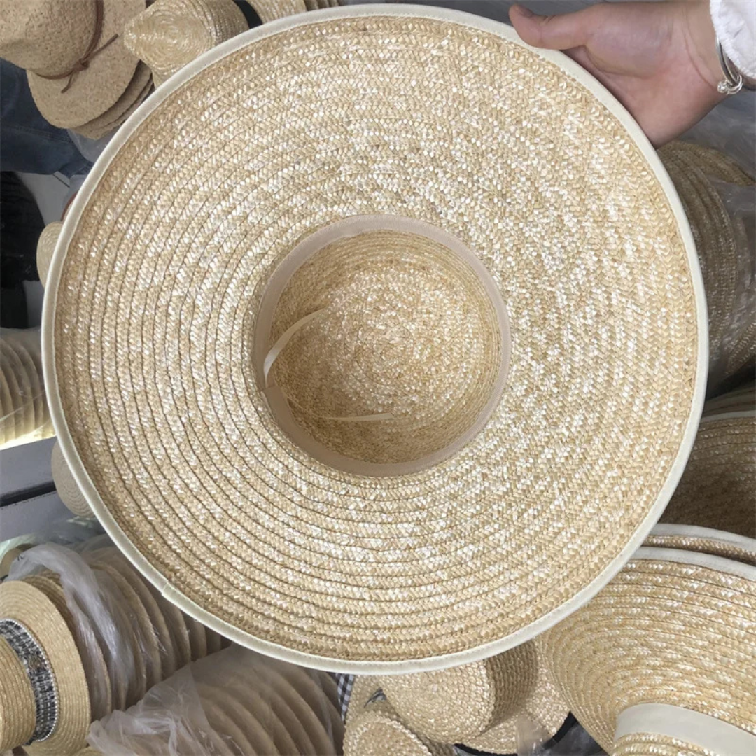 Close-up of a straw hat with a blurred background of similar hats.