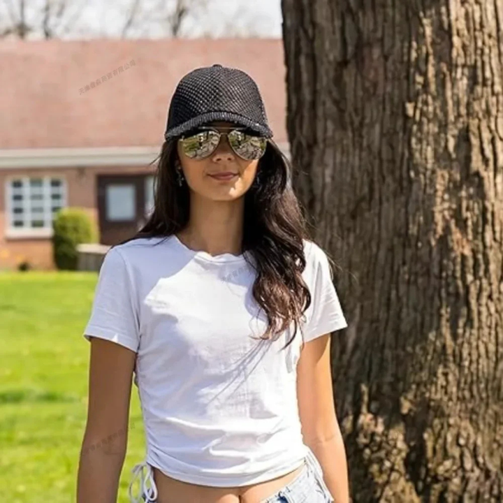 Women wearing black cap in a sunny day