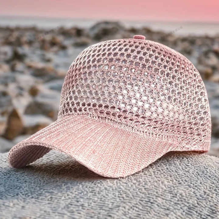 Pink glittery cap on a rock with a blurred natural background