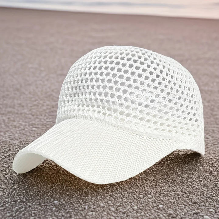 White mesh cap on a brown surface