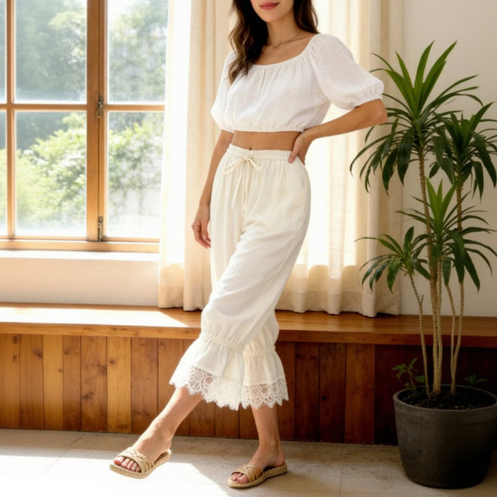 Delicate lace-edge capri pants for women, elegant cropped trousers with feminine lace trim detail, chic semi-formal summer bottoms