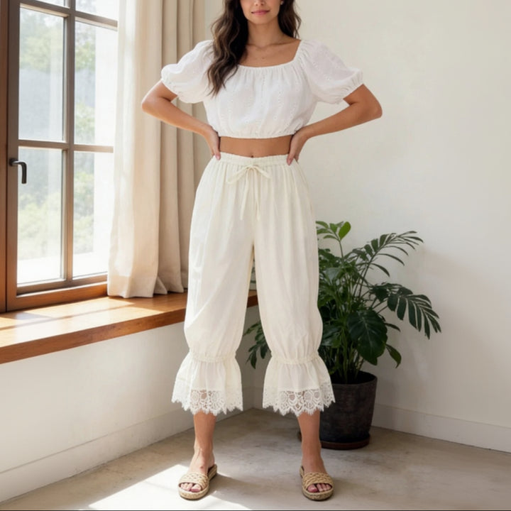 Delicate lace-edge capri pants for women, elegant cropped trousers with feminine lace trim detail, chic semi-formal summer bottoms