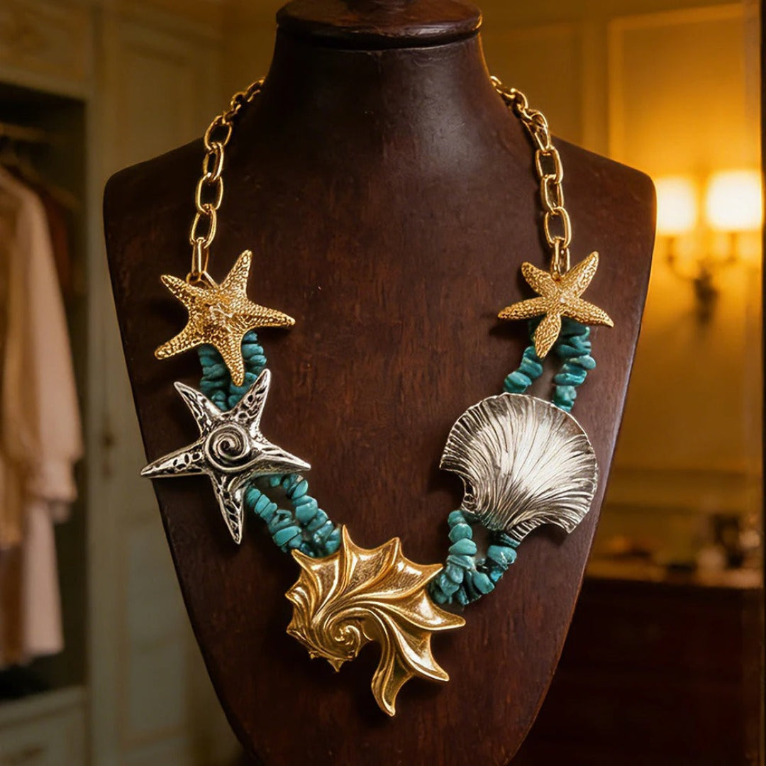 Thalassa star shell necklace, coastal-inspired shell jewelry for beach and summer fashion styling